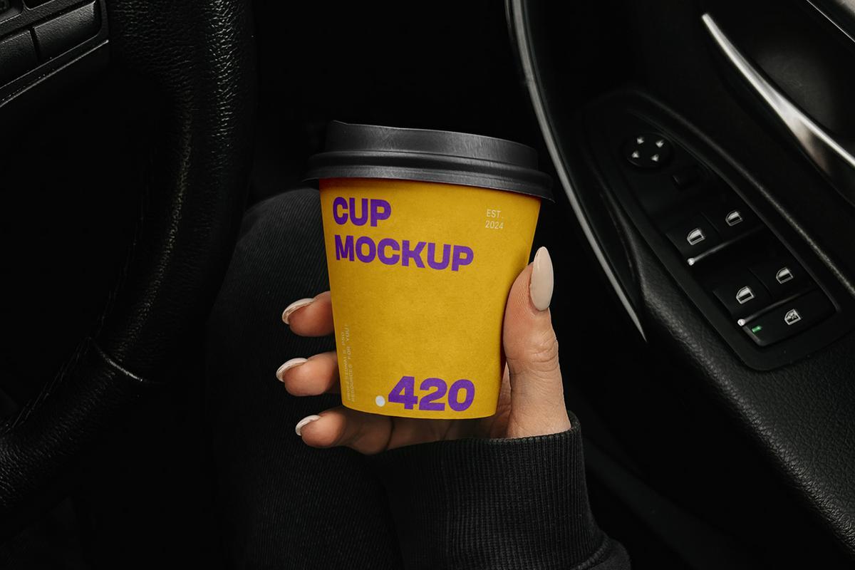 Free Paper Coffee Cup in the Car Mockup