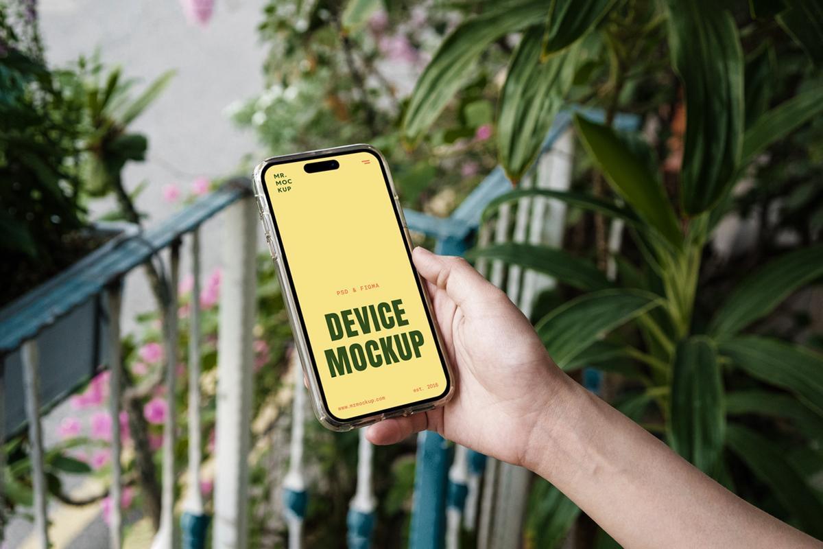 Free iPhone 16 Pro in Hand PSD Mockup